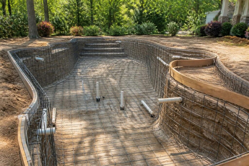 Pool reinforcement steel inspection questions shown at an unfinished North Carolina residential pool before concrete placement